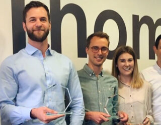 Mentored staff members at Thomson pose for a photo after completing the company's Learning and Development Programme © Mirka Orsagova / Thomsonec.com